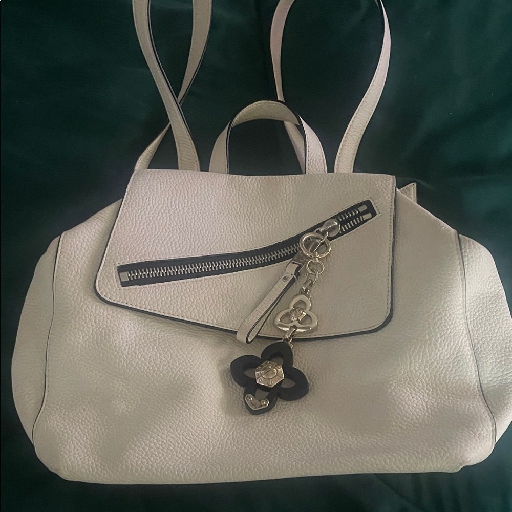 Henri Bendel Cream Shoulder Backpack with Silver hardware.